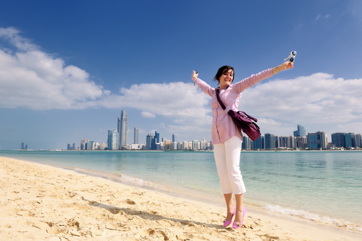 beautiful young woman tourist in dubai and abu dhabi at vacation and travel trip